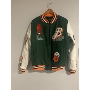 green and white varsity jacket. Streetwear Fashion Y2K Look